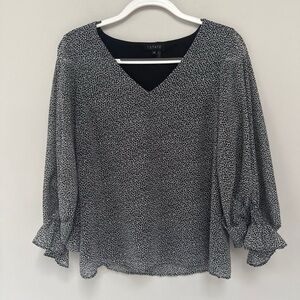 1. State Black and White Blouse with Puff Sleeves and Ruffled Style